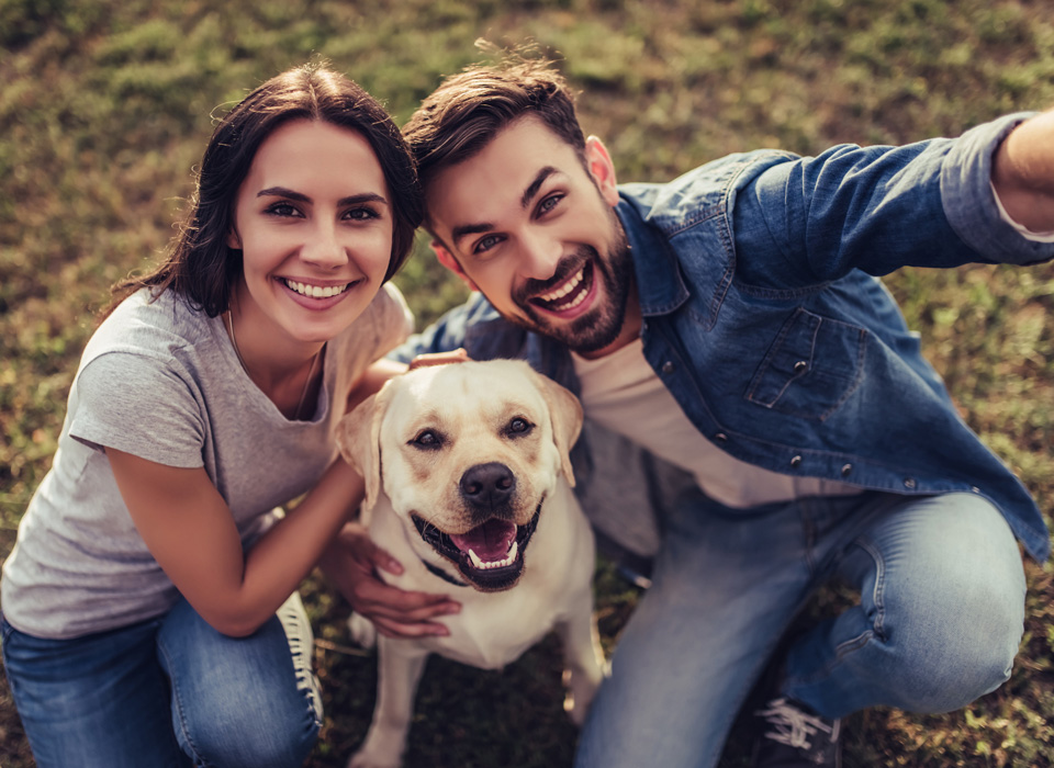 Couple with dog Dr Rothchild